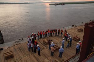 Safety meeting prior to vessel discharge in the Amazon River